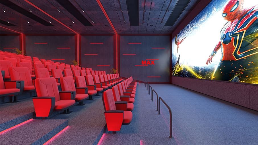 Cinema hall with red seating and large screen