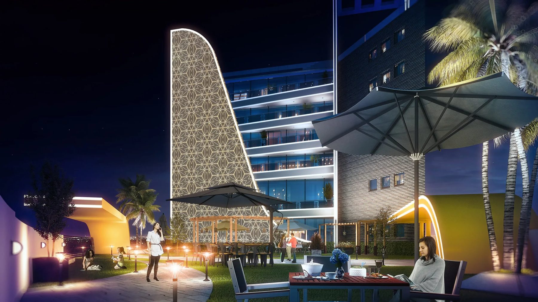 Hotel rooftop terrace at night with umbrellas, seating and palm trees